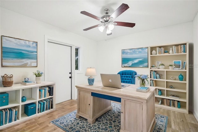 2220 3rd Ave E, Bradenton, FL 34208 - home office featuring light wood-style flooring and a ceiling fan