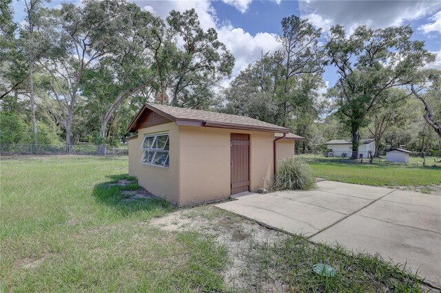 5201 E Jasmine Ln, Inverness, FL 34453 - view of outdoor structure featuring view of wooded area