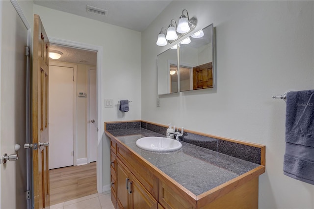 5201 E Jasmine Ln, Inverness, FL 34453 - bathroom featuring vanity and tile patterned flooring