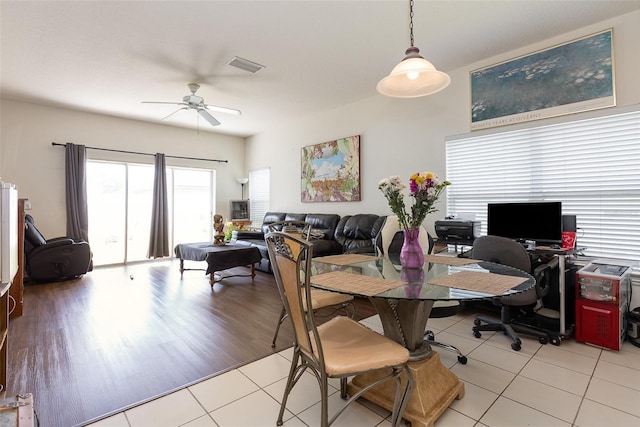 7603 Wood Violet Dr, Gibsonton, FL 33534 - dining space with ceiling fan, light tile patterned floors, and a desk