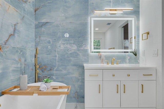 11296 115th St, Largo, FL 33778 - full bath featuring tile walls, a freestanding bath, and vanity