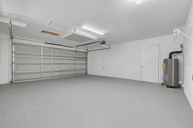 11296 115th St, Largo, FL 33778 - garage with water heater and a garage door opener