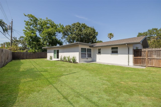 11296 115th St, Largo, FL 33778 - rear view of property featuring stucco siding