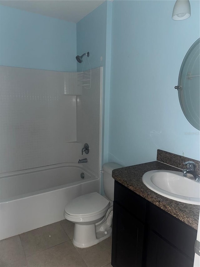 9833 Hound Chase Dr, Gibsonton, FL 33534 - full bathroom with vanity, toilet, shower / tub combination, and tile patterned flooring