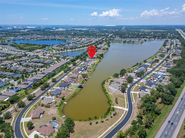 6425 Clair Shore Dr, Apollo Beach, FL 33572 - aerial view of property and surrounding area with nearby suburban area and a nearby body of water