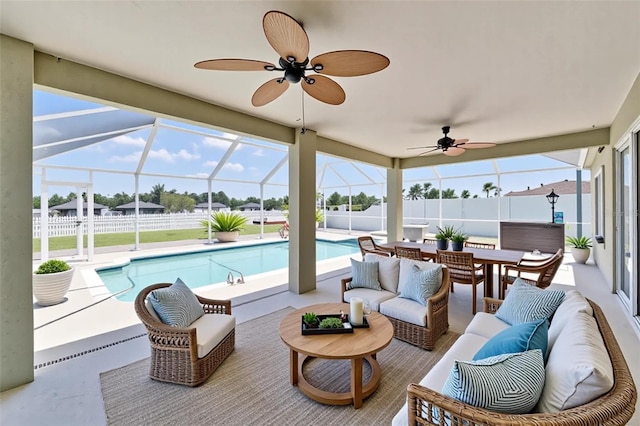 6425 Clair Shore Dr, Apollo Beach, FL 33572 - sunroom featuring a pool, an outdoor hangout area, a ceiling fan, and a jacuzzi