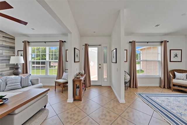 6425 Clair Shore Dr, Apollo Beach, FL 33572 - foyer with baseboards and light tile patterned flooring