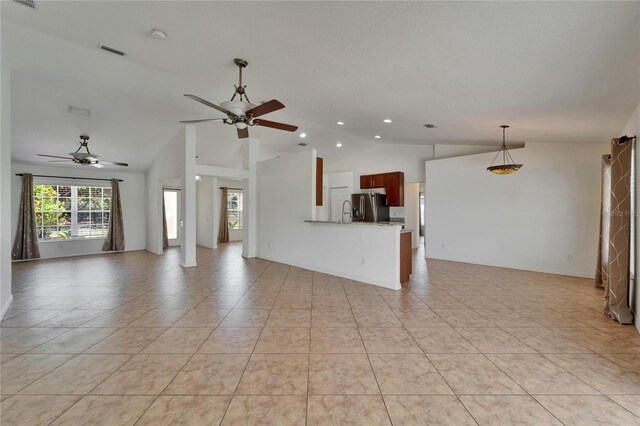 6425 Clair Shore Dr, Apollo Beach, FL 33572 - unfurnished living room featuring ceiling fan, vaulted ceiling, and recessed lighting