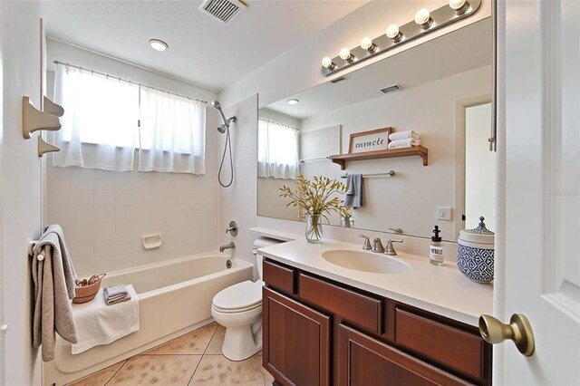 6425 Clair Shore Dr, Apollo Beach, FL 33572 - bathroom with vanity, toilet, shower / tub combination, and tile patterned floors