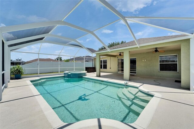 6425 Clair Shore Dr, Apollo Beach, FL 33572 - view of swimming pool with ceiling fan, a patio area, a pool with connected hot tub, and a lanai