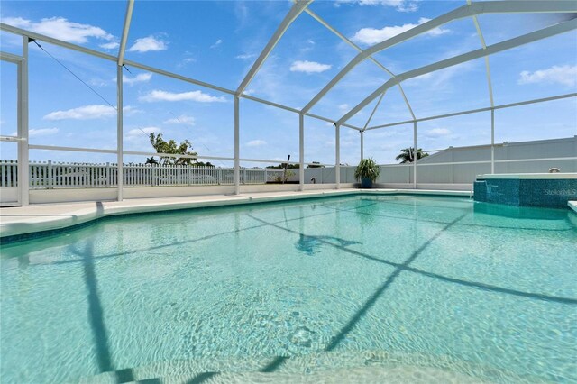 6425 Clair Shore Dr, Apollo Beach, FL 33572 - view of swimming pool with a lanai, a patio, and a pool with connected hot tub