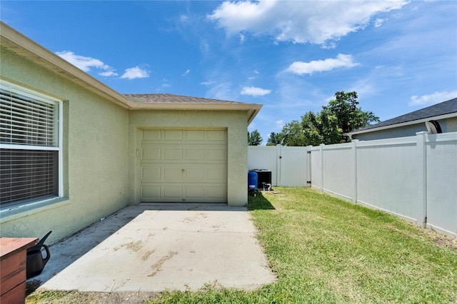6425 Clair Shore Dr, Apollo Beach, FL 33572 - garage featuring central AC