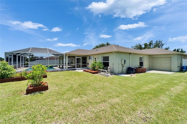 6425 Clair Shore Dr, Apollo Beach, FL 33572 - rear view of house with stucco siding, an attached garage, a yard, and a lanai