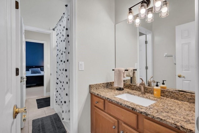 15934 Sorawater Dr, Lithia, FL 33547 - bathroom with vanity, tile patterned floors, a shower with curtain, and baseboards