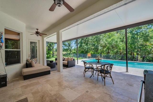 15934 Sorawater Dr, Lithia, FL 33547 - sunroom / solarium with a swimming pool and view of wooded area