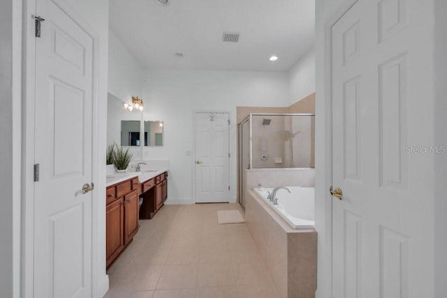 15934 Sorawater Dr, Lithia, FL 33547 - full bath with vanity, a stall shower, a bath, and tile patterned flooring