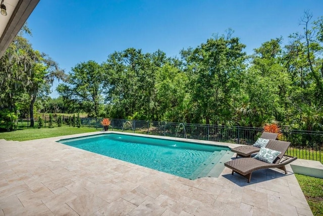 15934 Sorawater Dr, Lithia, FL 33547 - view of pool with a patio area and view of scattered trees