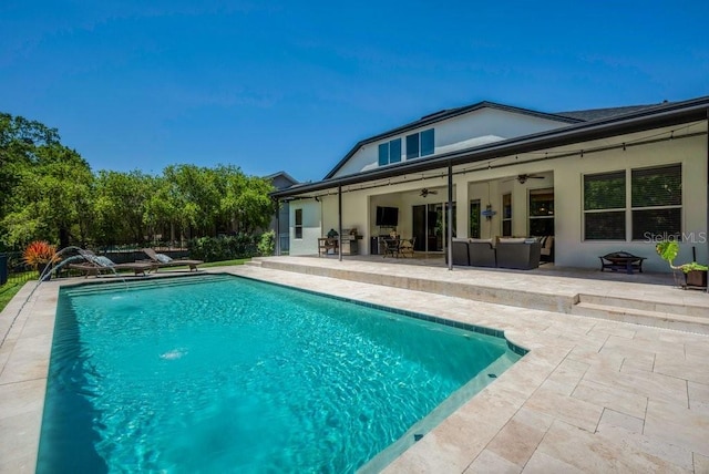 15934 Sorawater Dr, Lithia, FL 33547 - outdoor pool with ceiling fan, a patio area, and an outdoor hangout area