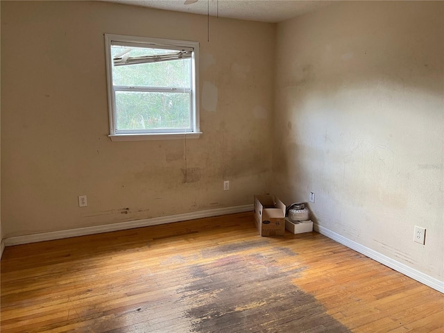 403 E Carolina Ave, Plant City, FL 33563 - unfurnished room featuring hardwood / wood-style flooring and baseboards