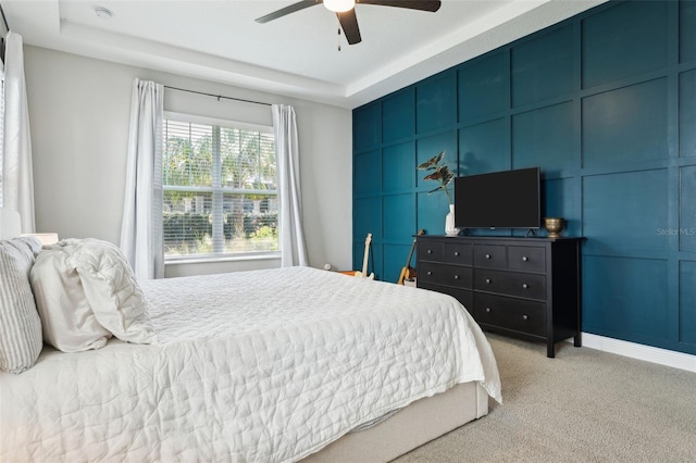 5314 Alafia Falls Dr, Lithia, FL 33547 - bedroom with carpet, a tray ceiling, and a ceiling fan