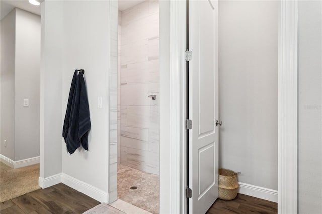 5314 Alafia Falls Dr, Lithia, FL 33547 - full bath featuring walk in shower, wood finished floors, and baseboards