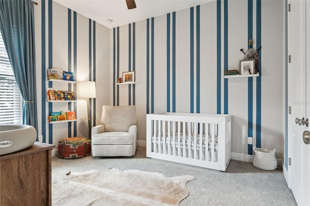 5314 Alafia Falls Dr, Lithia, FL 33547 - bedroom featuring a crib, carpet, wallpapered walls, and baseboards