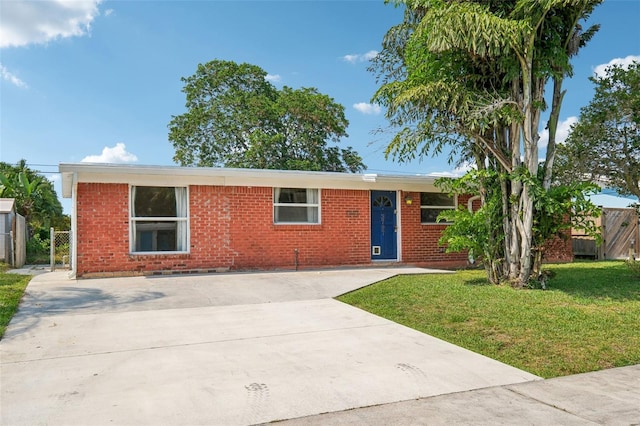 3797 Bahama Rd, Palm Beach Gardens, FL 33410 - ranch-style home featuring brick siding and concrete driveway