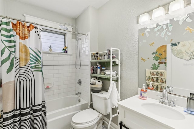 1206 E Frierson Ave Unit B, Tampa, FL 33603 - full bathroom featuring a textured wall, shower / tub combo, vanity, and toilet