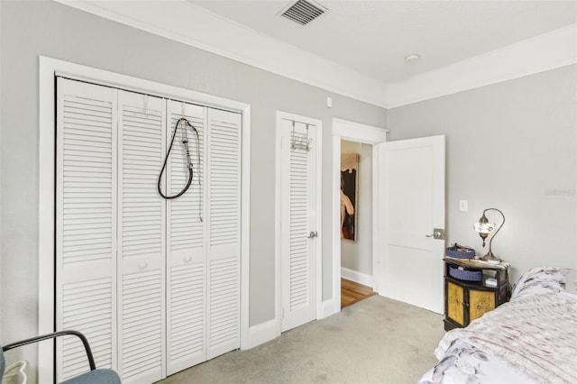 1206 E Frierson Ave Unit B, Tampa, FL 33603 - carpeted bedroom featuring a closet and baseboards