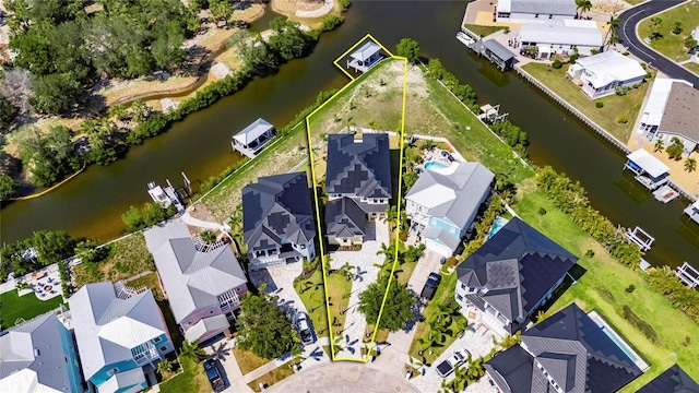 6522 Simone Shores Cir, Apollo Beach, FL 33572 - aerial perspective of suburban area with a large body of water and property boundaries highlighted