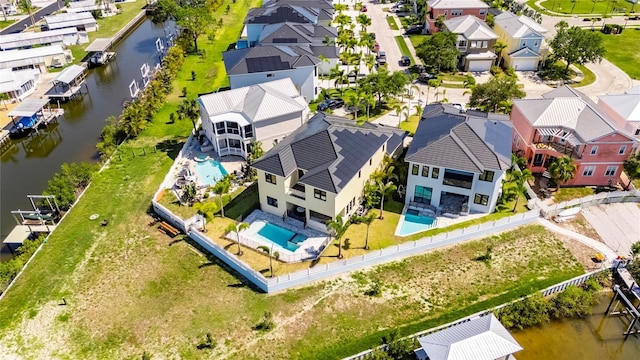 6522 Simone Shores Cir, Apollo Beach, FL 33572 - aerial view of residential area with a nearby body of water and a pool area