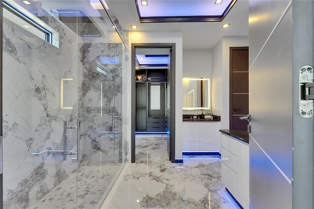 6522 Simone Shores Cir, Apollo Beach, FL 33572 - full bath with a marble finish shower, vanity, marble tiled flooring, and recessed lighting
