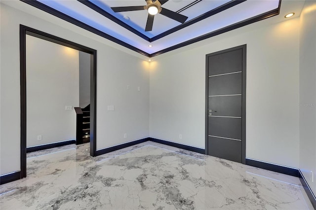 6522 Simone Shores Cir, Apollo Beach, FL 33572 - unfurnished bedroom featuring a tray ceiling, baseboards, marble tiled flooring, and recessed lighting