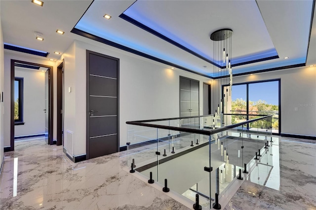6522 Simone Shores Cir, Apollo Beach, FL 33572 - rec room featuring a tray ceiling, marble tiled flooring, baseboards, and recessed lighting