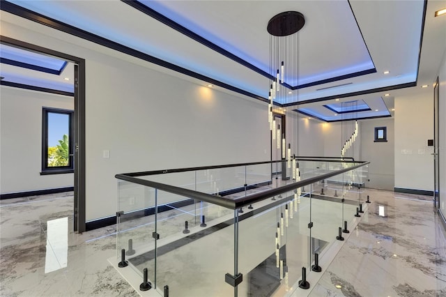 6522 Simone Shores Cir, Apollo Beach, FL 33572 - playroom featuring marble tiled floors, a raised ceiling, and baseboards