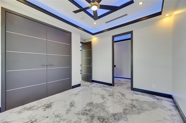 6522 Simone Shores Cir, Apollo Beach, FL 33572 - unfurnished bedroom with a raised ceiling, marble tiled floors, baseboards, and recessed lighting