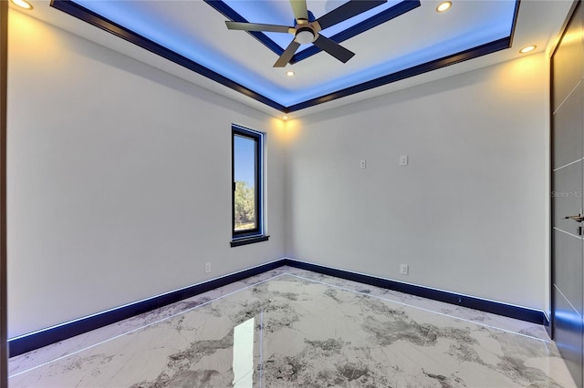 6522 Simone Shores Cir, Apollo Beach, FL 33572 - unfurnished room with a raised ceiling, recessed lighting, ceiling fan, marble finish floors, and baseboards