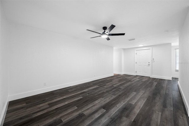 5109 Horton Rd, Plant City, FL 33567 - empty room featuring dark wood-type flooring, a ceiling fan, and baseboards