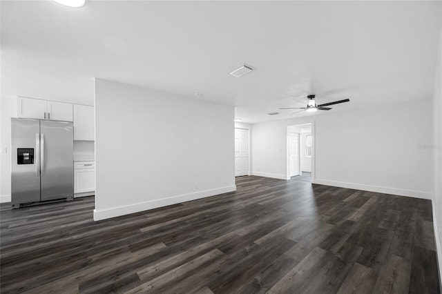 5109 Horton Rd, Plant City, FL 33567 - unfurnished living room featuring dark wood-style floors, baseboards, and a ceiling fan