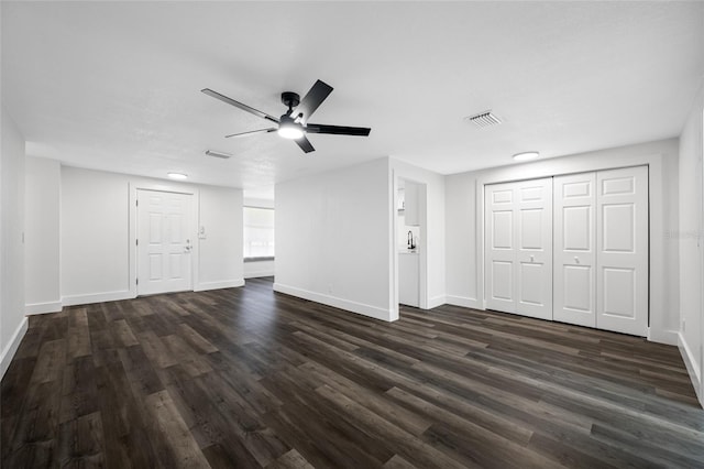 5109 Horton Rd, Plant City, FL 33567 - unfurnished living room featuring baseboards, dark wood finished floors, and a ceiling fan