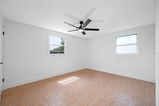 5109 Horton Rd, Plant City, FL 33567 - spare room featuring ceiling fan, baseboards, and light tile patterned floors