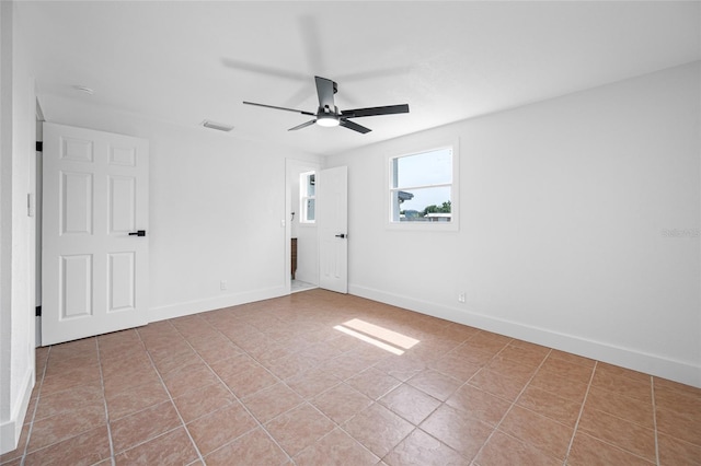 5109 Horton Rd, Plant City, FL 33567 - tiled empty room with ceiling fan and baseboards