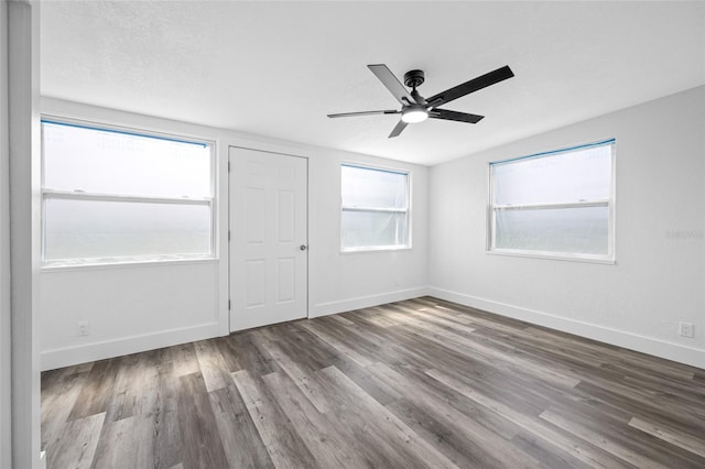 5109 Horton Rd, Plant City, FL 33567 - empty room featuring a ceiling fan, wood finished floors, and baseboards