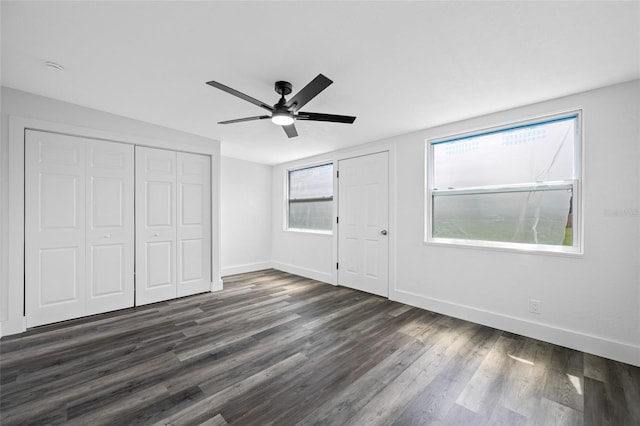 5109 Horton Rd, Plant City, FL 33567 - unfurnished bedroom with dark wood-style floors, baseboards, a closet, and ceiling fan