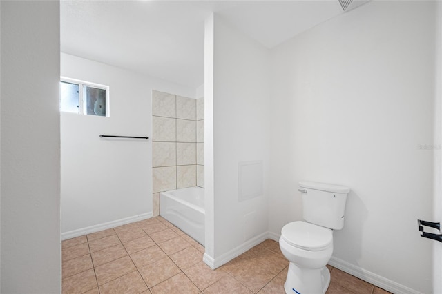 5109 Horton Rd, Plant City, FL 33567 - bathroom featuring toilet, tile patterned flooring, and baseboards