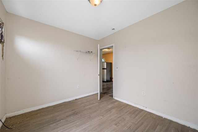 5109 Horton Rd, Plant City, FL 33567 - spare room with wood finished floors and baseboards