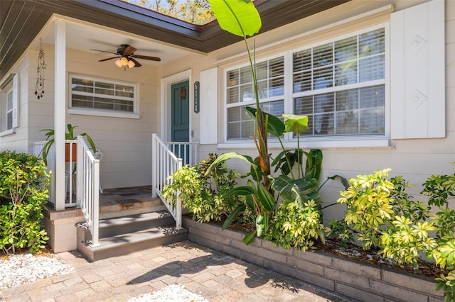 6114 7th Ave S, Gulfport, FL 33707 - view of exterior entry featuring ceiling fan and covered porch