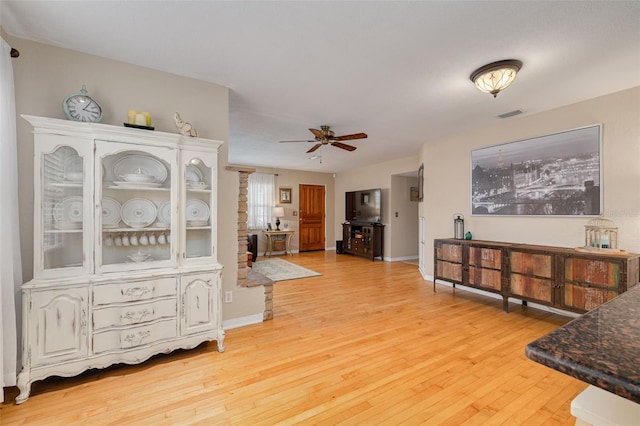 6114 7th Ave S, Gulfport, FL 33707 - hall with light wood-type flooring and baseboards