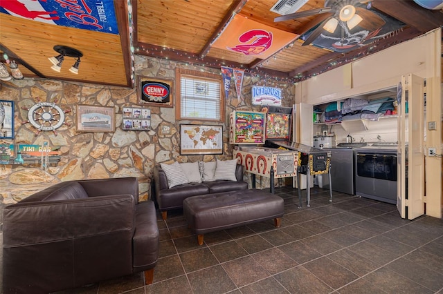 6114 7th Ave S, Gulfport, FL 33707 - living area featuring wood ceiling, a ceiling fan, and dark tile patterned flooring