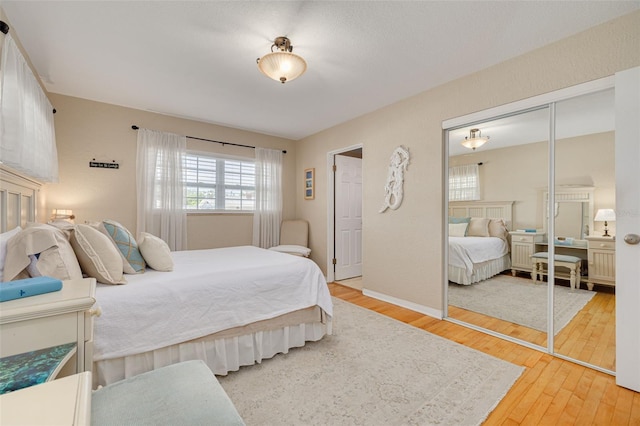 6114 7th Ave S, Gulfport, FL 33707 - bedroom with wood finished floors and baseboards